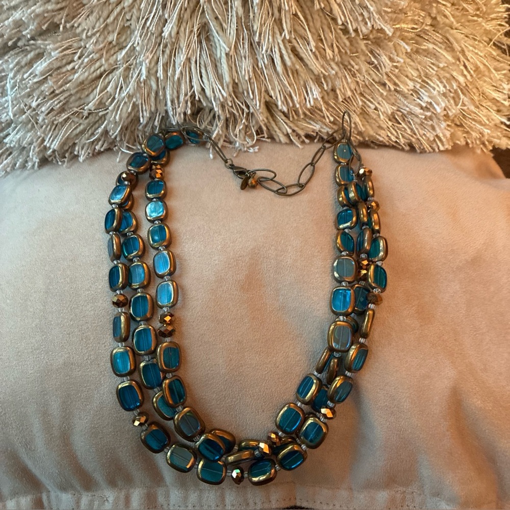 Stefanie Wolf 3 strand blue glass and bronze bead necklace, signed